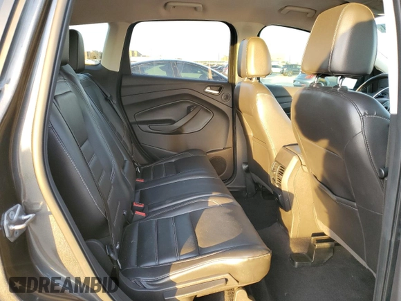 2017 Ford Escape SE with VIN 1FMCU0G91HUE07265, listed as a Copart auction lot 84231444 with 82,990 mi miles and Clean Title. Bid and sale history available at DreamBid. Image 11.