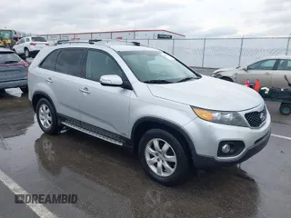 2012 Kia Sorento LX with VIN 5XYKTDA61CG303393, listed as a IAAI auction lot 41137220 with 123,474 mi miles. Bid and sale history available at carsss.com. Image 1.