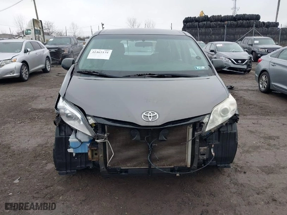 2015 Toyota Sienna L with VIN 5TDZK3DC9FS582287, listed as a IAAI auction lot 41465131 with NaN miles. Bid and sale history available at carsss.com. Image 13.