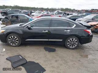 2016 Nissan Altima 2.5 SL with VIN 1N4AL3AP4GC161524, listed as a IAAI auction lot 41317383 with 144,810 mi miles. Bid and sale history available at carsss.com. Image 14.