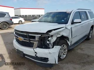 2015 Chevrolet Suburban LT with VIN 1GNSCJKC9FR702598, listed as a IAAI auction lot 41909771 with 150,206 mi miles and . Bid and sale history available at DreamBid. Image 6.