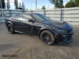 2021 Dodge Charger SRT Hellcat Redeye Widebody with VIN 2C3CDXL93MH660916, listed as a Copart auction lot 83921594 with 27,729 mi miles and Clean Title. Bid and sale history available at carsss.com. Image 4.