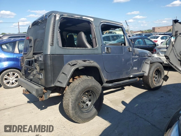 2002 Jeep Wrangler Sport with VIN 1J4FA49S72P715946, listed as a Copart auction lot 70884114 with 114,964 mi miles and Clean Title. Bid and sale history available at carsss.com. Image 3.