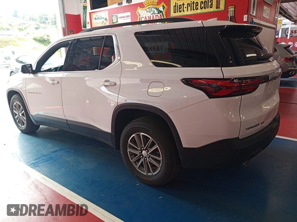 2022 Chevrolet Traverse LT with VIN 1GNEVHKW7NJ155600, listed as a IAAI auction lot 42793694 with 78,927 mi miles and . Bid and sale history available at DreamBid. Image 4.