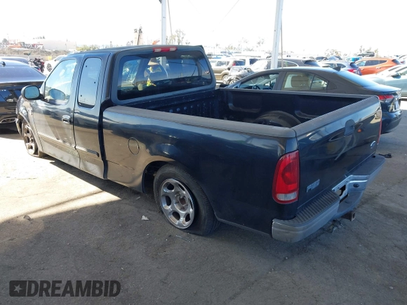 2002 Ford F-150 XL with VIN 1FTRX17WX2NB99454, listed as a IAAI auction lot 41643850 with 180,149 mi miles. Bid and sale history available at carsss.com. Image 3.