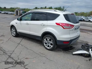 2016 Ford Escape Titanium with VIN 1FMCU9J98GUA00832, listed as a IAAI auction lot 42188941 with 90,764 mi miles and . Bid and sale history available at DreamBid. Image 3.
