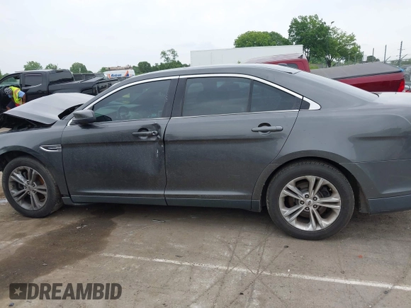 2015 Ford Taurus SEL z VIN 1FAHP2E81FG163058, wystawiony jako IAAI lot #42279778 z przebiegiem 127 957 mil mil oraz . Historia ofert i sprzedaży dostępna na DreamBid. Obrazek 14.