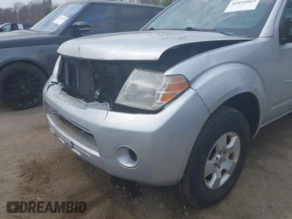2011 Nissan Pathfinder Silver z VIN 5N1AR1NB7BC626734, wystawiony jako IAAI lot #41854063 z przebiegiem 72 906 mil mil oraz . Historia ofert i sprzedaży dostępna na DreamBid. Obrazek 16.
