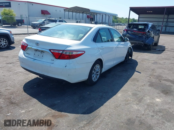 2015 Toyota Camry XLE with VIN 4T1BF1FK6FU948938, listed as a IAAI auction lot 42023487 with 107,232 mi miles. Bid and sale history available at carsss.com. Image 4.