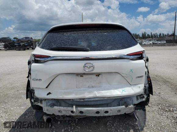 2019 Mazda CX-9 Touring with VIN JM3TCACY7K0327632, listed as a Copart auction lot 60798635 with 63,087 mi miles and Salvage title. Bid and sale history available at DreamBid. Image 6.