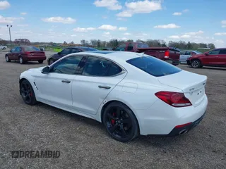 2021 Genesis G70 3.3T with VIN KMTG34LEXMU076278, listed as a IAAI auction lot 41976406 with 44,684 mi miles and . Bid and sale history available at DreamBid. Image 3.