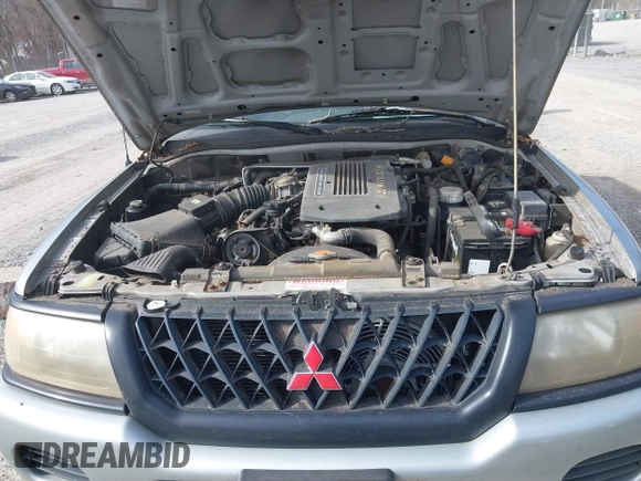 2000 Mitsubishi Montero LS z VIN JA4LS31H9YP005577, wystawiony jako IAAI lot #41590624 z przebiegiem 149 625 mil mil oraz . Historia ofert i sprzedaży dostępna na DreamBid. Obrazek 10.