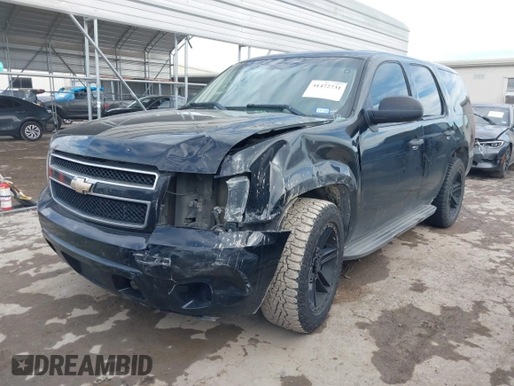 2011 Chevrolet Tahoe Commercial with VIN 1GNLC2E00BR325388, listed as a IAAI auction lot 41472731 with 265,781 mi miles and . Bid and sale history available at DreamBid. Image 18.