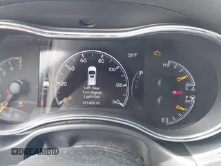 2018 Jeep Grand Cherokee Laredo E with VIN 1C4RJEAG3JC300760, listed as a IAAI auction lot 41811734 with 131,406 mi miles. Bid and sale history available at carsss.com. Image 7.
