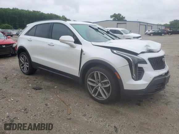 2019 Cadillac XT4 FWD Sport z VIN 1GYFZER49KF199885, wystawiony jako Copart lot #56836895 z przebiegiem 58 486 mil mil oraz Szkoda całkowita • Salvage title. Historia ofert i sprzedaży dostępna na DreamBid. Obrazek 4.