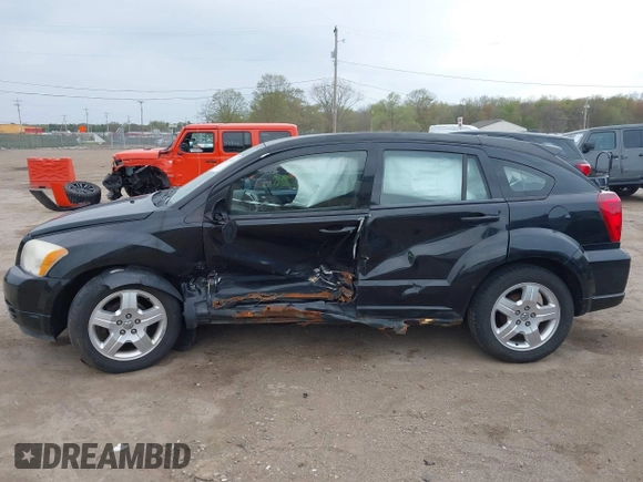 2009 Dodge Caliber SXT z VIN 1B3HB48A79D236542, wystawiony jako IAAI lot #42138476 z przebiegiem Nie podano mil oraz . Historia ofert i sprzedaży dostępna na DreamBid. Obrazek 14.