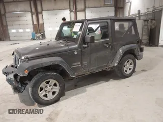 2014 Jeep Wrangler Sport with VIN 1C4AJWAG6EL167579, listed as a IAAI auction lot 41801276 with 137,639 mi miles and . Bid and sale history available at DreamBid. Image 2.