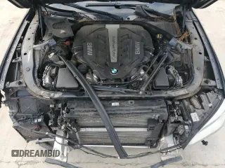 2015 BMW 7 Series 750i z VIN WBAYA8C51FG197764, wystawiony jako Copart lot #67095554 z przebiegiem 167 458 mil mil oraz Szkoda całkowita • Salvage title. Historia ofert i sprzedaży dostępna na DreamBid. Obrazek 11.