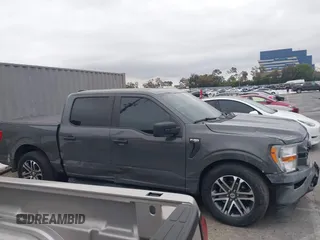 2021 Ford F-150 XL z VIN 1FTEW1CP1MKD41646, wystawiony jako IAAI lot #42174841 z przebiegiem 52 968 mil mil oraz . Historia ofert i sprzedaży dostępna na DreamBid. Obrazek 13.