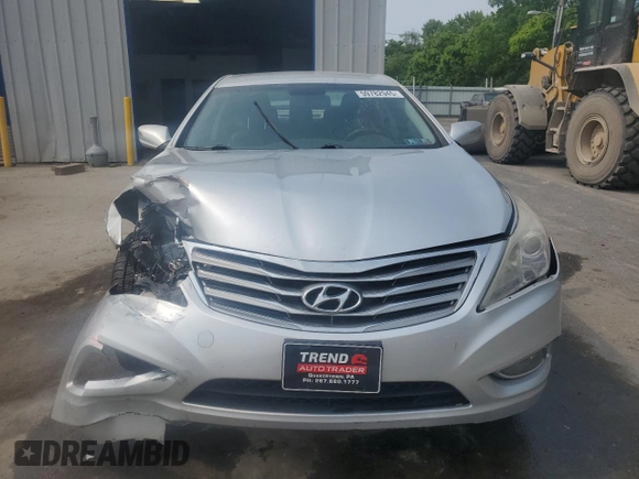 2013 Hyundai Azera с VIN KMHFG4JG5DA204636, выставлен на аукционе Copart как лот 59782945 с пробегом 74 494 миль миль и Списание • Salvage title. История ставок и продаж доступна на DreamBid. Изображение 5.