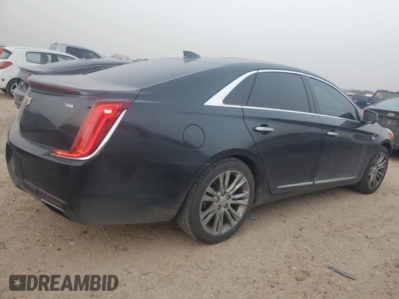 2018 Cadillac XTS Luxury z VIN 2G61M5S31J9168804, wystawiony jako Copart lot #47566135 z przebiegiem 86 112 mil mil oraz Szkoda całkowita • Salvage title. Historia ofert i sprzedaży dostępna na DreamBid. Obrazek 3.