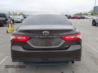2019 Toyota Camry LE z VIN 4T1B11HK7KU702244, wystawiony jako IAAI lot #42073380 z przebiegiem 72 602 mil mil oraz . Historia ofert i sprzedaży dostępna na DreamBid. Obrazek 16.