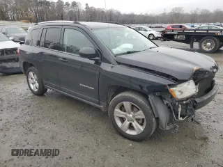 2012 Jeep Compass Sport with VIN 1C4NJCBB2CD613575, listed as a Copart auction lot 85057354 with 203,677 mi miles and Salvage Title. Bid and sale history available at carsss.com. Image 4.
