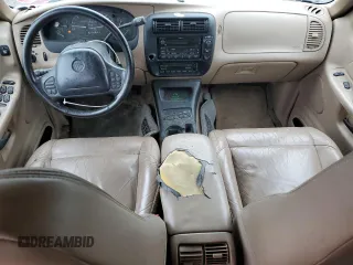 1999 Mercury Mountaineer z VIN 4M2DU55P5XUJ16364, wystawiony jako Copart lot #57493435 z przebiegiem 166 256 mil mil oraz Tytuł czysty. Historia ofert i sprzedaży dostępna na DreamBid. Obrazek 8.