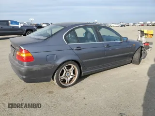 2002 BMW 3 Series 330i with VIN WBAEV53402KM20672, listed as a Copart auction lot 47172975 with 129,657 mi miles and Clean Title. Bid and sale history available at carsss.com. Image 3.