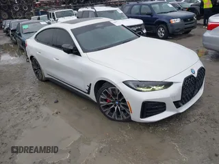 2022 BMW 4 Series M440i xDrive z VIN WBA13AW09NFM30121, wystawiony jako IAAI lot #41806019 z przebiegiem 48 735 mil mil oraz . Historia ofert i sprzedaży dostępna na DreamBid. Obrazek 1.