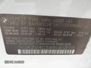 2011 BMW X5 35i with VIN 5UXZV4C54BL412770, listed as a IAAI auction lot 41618946 with 148,612 mi miles. Bid and sale history available at carsss.com. Image 9.