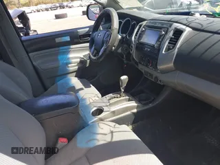 2014 Toyota Tacoma with VIN 3TMLU4EN4EM154261, listed as a IAAI auction lot 42119237 with 211,929 mi miles and . Bid and sale history available at DreamBid. Image 5.