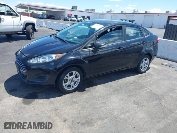 2014 Ford Fiesta SE with VIN 3FADP4BJ1EM204083, listed as a IAAI auction lot 42149088 with 136,209 mi miles and . Bid and sale history available at DreamBid. Image 2.