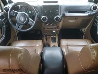 2011 Jeep Wrangler Unlimited Sahara with VIN 1J4BA5H19BL562457, listed as a Copart auction lot 44646965 with 184,155 mi miles and Salvage Title. Bid and sale history available at carsss.com. Image 8.