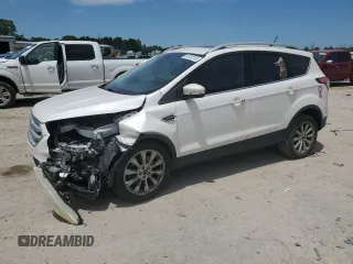 2018 Ford Escape Titanium with VIN 1FMCU0J99JUA06741, listed as a Copart auction lot 55782195 with 103,392 mi miles and Salvage title. Bid and sale history available at DreamBid. Image 1.