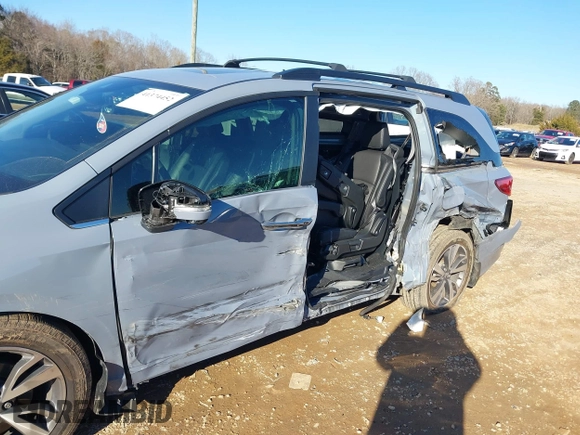 2023 Honda Odyssey Touring with VIN 5FNRL6H84PB005208, listed as a IAAI auction lot 41374452 with 60,288 mi miles and . Bid and sale history available at DreamBid. Image 6.
