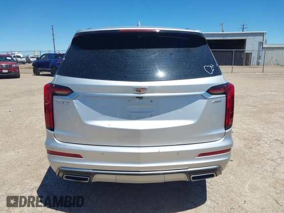 2020 Cadillac XT6 FWD Premium Luxury with VIN 1GYKPCRS7LZ104392, listed as a IAAI auction lot 42278675 with 81,001 mi miles and . Bid and sale history available at DreamBid. Image 16.