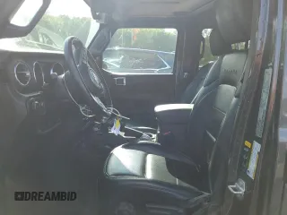 2022 Jeep Wrangler Unlimited Sahara z VIN 1C4HJXEN0NW110192, wystawiony jako Copart lot #57206625 z przebiegiem 32 964 mil mil oraz Szkoda całkowita • Salvage title. Historia ofert i sprzedaży dostępna na DreamBid. Obrazek 7.