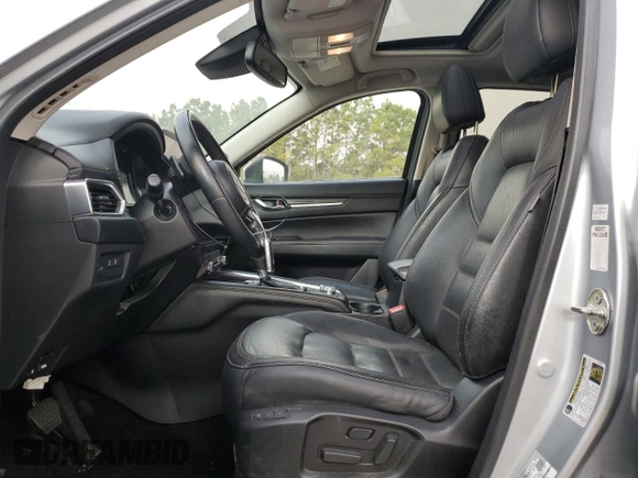 2021 Mazda CX-5 Grand Touring with VIN JM3KFADM8M1339008, listed as a Copart auction lot 49150115 with 144,851 mi miles and Salvage Title. Bid and sale history available at carsss.com. Image 7.
