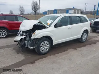 2014 Dodge Journey SE with VIN 3C4PDCAB7ET134454, listed as a IAAI auction lot 41625094 with 145,814 mi miles. Bid and sale history available at carsss.com. Image 2.