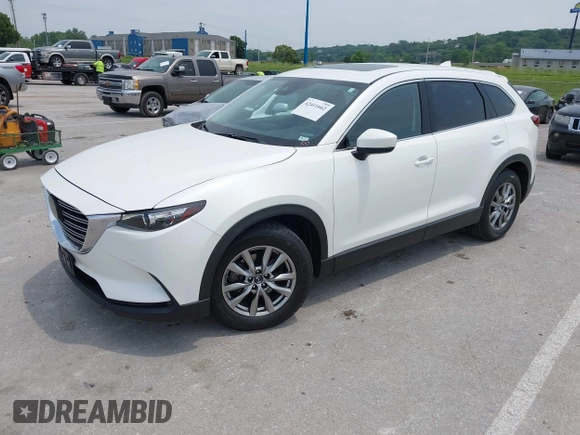 2019 Mazda CX-9 Touring with VIN JM3TCACY1K0334804, listed as a IAAI auction lot 42411662 with 49,447 mi miles and . Bid and sale history available at DreamBid. Image 18.