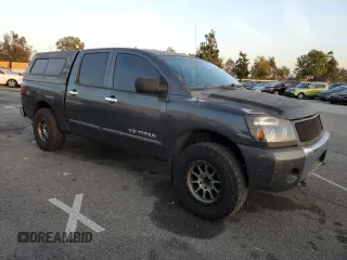 2007 Nissan Titan XE with VIN 1N6AA07A07N217705, listed as a Copart auction lot 86836804 with 272,228 mi miles and Salvage Title. Bid and sale history available at DreamBid. Image 4.