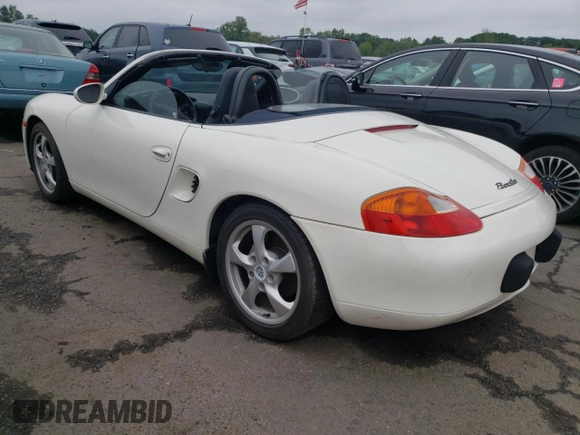 2001 Porsche Boxster z VIN WP0CA29821U622592, wystawiony jako Copart lot #56050735 z przebiegiem Nie podano mil oraz Szkoda całkowita • Salvage title. Historia ofert i sprzedaży dostępna na DreamBid. Obrazek 2.