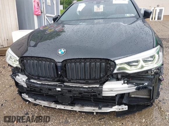 2018 BMW 5 Series M550i xDrive with VIN WBAJB9C5XJB286923, listed as a IAAI auction lot 42527301 with 76,923 mi miles and . Bid and sale history available at DreamBid. Image 17.