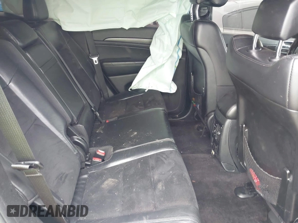 2018 Jeep Grand Cherokee Laredo with VIN 1C4RJFAG4JC303222, listed as a IAAI auction lot 42276244 with 83,585 mi miles and . Bid and sale history available at DreamBid. Image 8.