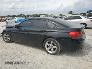 2015 BMW 4 Series 428i with VIN WBA4A5C55FG051557, listed as a Copart auction lot 47899115 with 91,292 mi miles and Salvage Title. Bid and sale history available at DreamBid. Image 2.