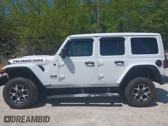 2021 Jeep Wrangler Unlimited Rubicon with VIN 1C4HJXFG5MW586842, listed as a IAAI auction lot 42186683 with 76,450 mi miles and . Bid and sale history available at DreamBid. Image 14.