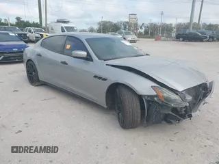 2014 Maserati Quattroporte GTS z VIN ZAM56PPA2E1074982, wystawiony jako IAAI lot #41588842 z przebiegiem Nie podano mil oraz . Historia ofert i sprzedaży dostępna na DreamBid. Obrazek 1.