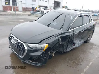 2021 Audi Q3 Premium with VIN WA1AUCF31M1131914, listed as a IAAI auction lot 41571543 with 35,477 mi miles and . Bid and sale history available at DreamBid. Image 2.