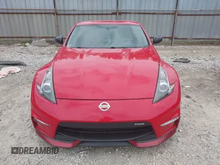 2016 Nissan 370Z Sport z VIN JN1AZ4EH7GM931035, wystawiony jako IAAI lot #42311165 z przebiegiem 83 947 mil mil oraz . Historia ofert i sprzedaży dostępna na DreamBid. Obrazek 12.